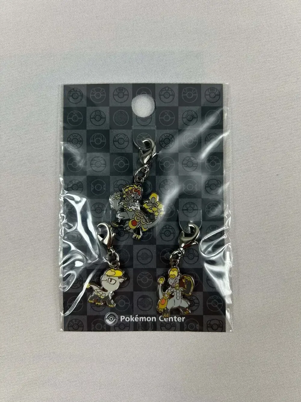 Pokemon Center Jangmo-o, Hakamo-o, & Kommo-o Metal Charm Clip New Sealed